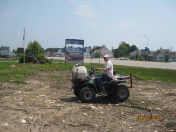 Charlie spraying the  weeds.