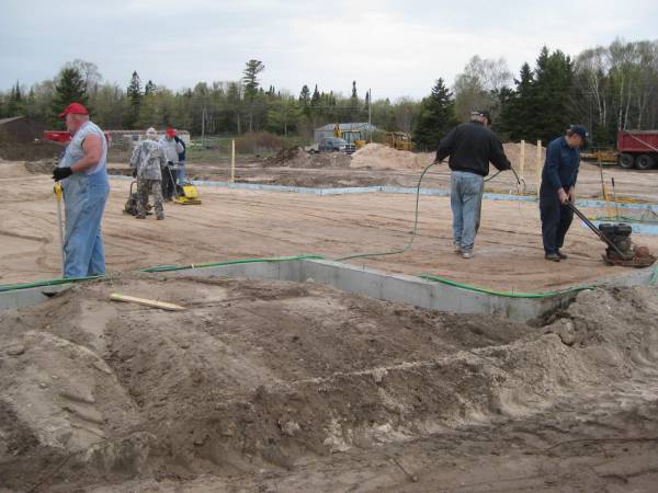 Compacting the sand